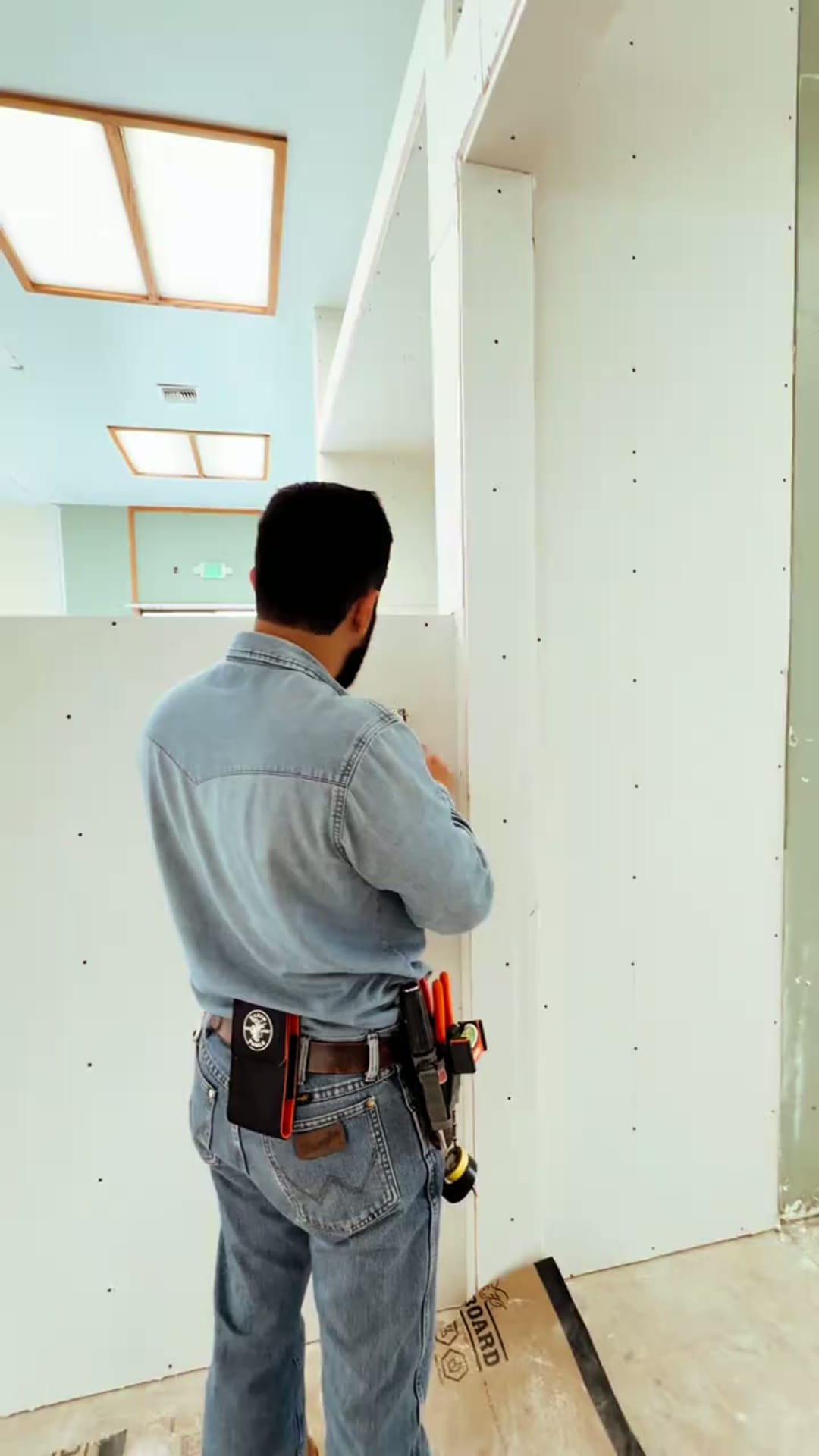 Covenant electrician installing on the job